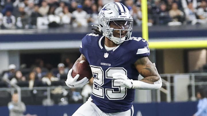 Dallas Cowboys running back Rico Dowdle runs with the ball during the game against the Washington Commanders Dallas Cowboys running back Rico Dowdle runs with the ball during the game against the Washington Commanders