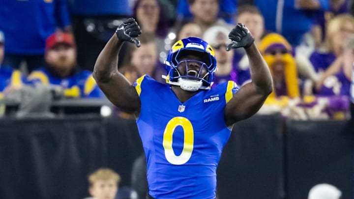 Jan 13, 2025; Glendale, AZ, USA; Los Angeles Rams linebacker Byron Young (0) celebrates a play against the Minnesota Vikings during an NFC wild card game at State Farm Stadium. Mandatory Credit: Mark J. Rebilas-Imagn Images Jan 13, 2025; Glendale, AZ, USA; Los Angeles Rams linebacker Byron Young (0) celebrates a play against the Minnesota Vikings during an NFC wild card game at State Farm Stadium. Mandatory Credit: Mark J. Rebilas-Imagn Images