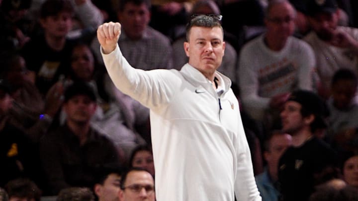 Feb 22, 2025; Nashville, Tennessee, USA; Vanderbilt Commodores head coach Mark Byington paces the sidelines against the Mississippi Rebels during the first half at Memorial Gymnasium. Mandatory Credit: Steve Roberts-Imagn Images Feb 22, 2025; Nashville, Tennessee, USA; Vanderbilt Commodores head coach Mark Byington paces the sidelines against the Mississippi Rebels during the first half at Memorial Gymnasium. Mandatory Credit: Steve Roberts-Imagn Images