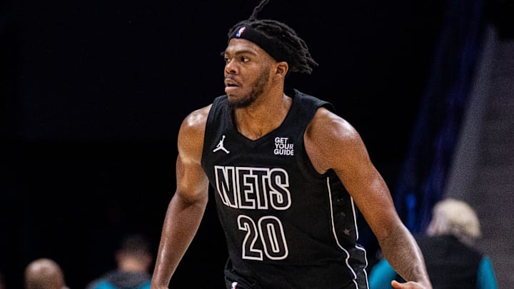 Mar 8, 2025; Charlotte, North Carolina, USA; Brooklyn Nets center Day'Ron Sharpe (20) brings the ball up court against the Charlotte Hornets during the second quarter at Spectrum Center. Mandatory Credit: Scott Kinser-Imagn Images Mar 8, 2025; Charlotte, North Carolina, USA; Brooklyn Nets center Day'Ron Sharpe (20) brings the ball up court against the Charlotte Hornets during the second quarter at Spectrum Center. Mandatory Credit: Scott Kinser-Imagn Images