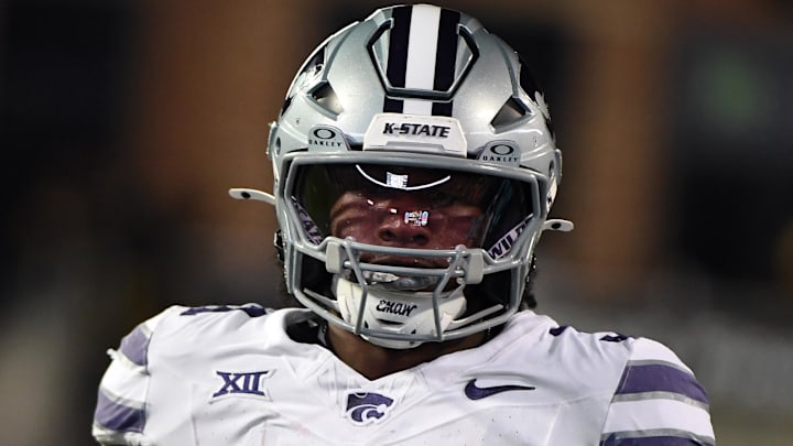 Oct 12, 2024; Boulder, Colorado, USA; Kansas State Wildcats running back DJ Giddens (31) warms up before the game against the Colorado Buffaloes at Folsom Field. Mandatory Credit: Christopher Hanewinckel-Imagn Images