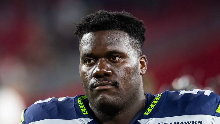 Seattle Seahawks center Olu Oluwatimi stands on the sidelines Seattle Seahawks center Olu Oluwatimi stands on the sidelines