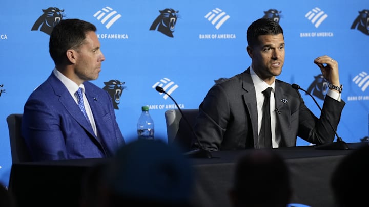 Feb 1, 2024; Charlotte, NC, USA; Carolina Panthers head coach Dave Canales speaks to the media as general manager Dan Morgan looks on during the introductory press conference at Bank of America Stadium