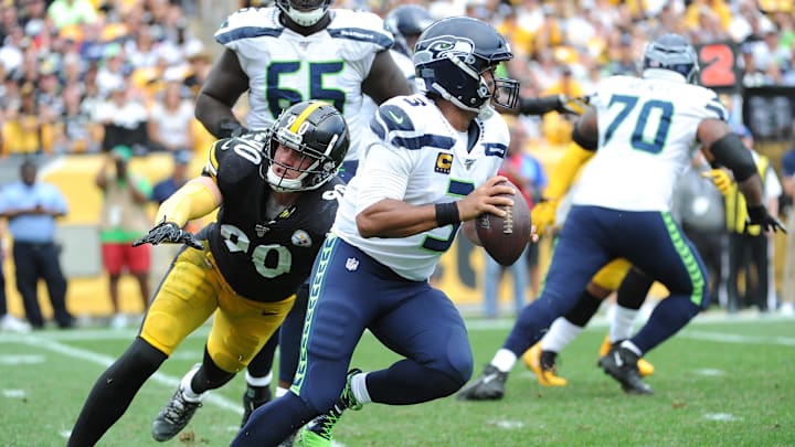 Sep 15, 2019; Pittsburgh, PA, USA; Pittsburgh Steelers linebacker T.J. Watt (90) pressures Seattle Seahawks quarterback Russell Wilson (3) during the fourth quarter at Heinz Field.