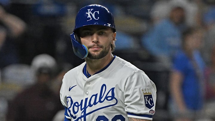 Sep 2, 2025; Kansas City, Missouri, USA;  Kansas City Royals pinch hitter Carter Jensen (22) walks back to the dugout after striking out to end the game against the Los Angeles Angels at Kauffman Stadium. Mandatory Credit: Peter Aiken-Imagn Images