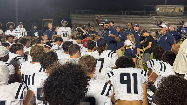 Sierra Canyon football coach Jon Ellinghouse speaks to his team after beating Chaminade-Madonna 24-7 in Florida on Thursday, August 27, 2026.