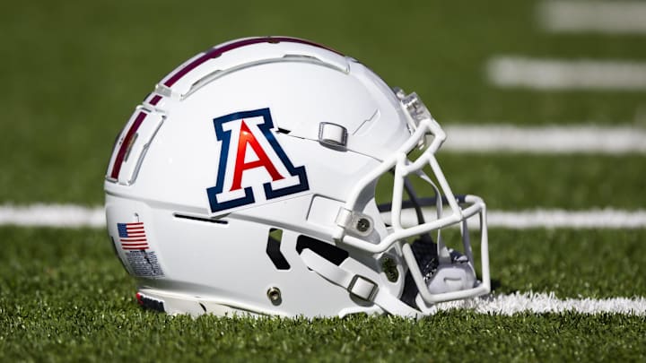 Nov 25, 2022; Tucson, Arizona, USA; Detailed view of an Arizona Wildcats helmet on the field during the Territorial Cup at Arizona Stadium. Mandatory Credit: Mark J. Rebilas-Imagn Images