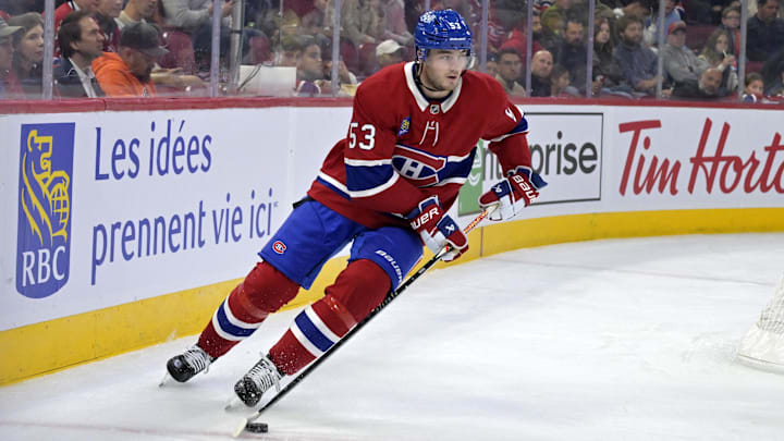 Sep 22, 2025; Montreal, Quebec, CAN; Montreal Canadiens defenseman Noah Dobson (53) plays the puck during the first period of the game against the Pittsburgh Penguins at the Bell Centre. Mandatory Credit: Eric Bolte-Imagn Images