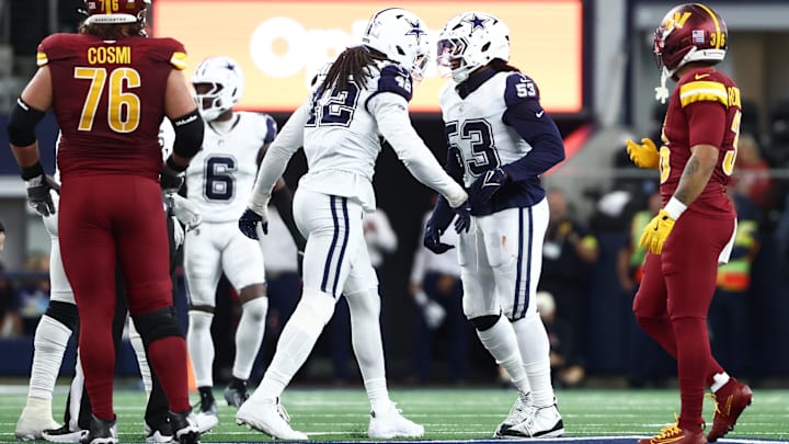Dallas Cowboys DEs Jadeveon Clowney and James Houston (53) celebrate after a sack against the Washington Commanders. Dallas Cowboys DEs Jadeveon Clowney and James Houston (53) celebrate after a sack against the Washington Commanders.