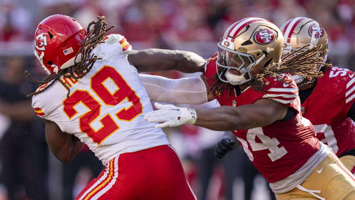 October 20, 2024; Santa Clara, California, USA; San Francisco 49ers linebacker Fred Warner (54) tackles Kansas City Chiefs running back Kareem Hunt (29) during the third quarter at Levi's Stadium. Mandatory Credit: Kyle Terada-Imagn Images
