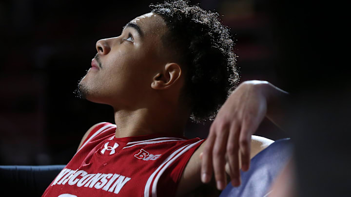 Wisconsin Badgers guard John Tonje (9) watches as the starting lineups are announced Saturday, Dec. 14, 2024, during the NCAA men’s basketball game against the Butler Bulldogs at Gainbridge Fieldhouse in Indianapolis.