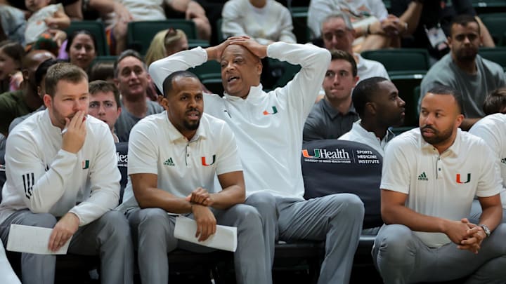 Jan 18, 2025; Coral Gables, Florida, USA; Miami Hurricanes interim head coach Bill Courtney reacts from the bench against the Southern Methodist Mustangs during the first half at Watsco Center. Mandatory Credit: Sam Navarro-Imagn Images Jan 18, 2025; Coral Gables, Florida, USA; Miami Hurricanes interim head coach Bill Courtney reacts from the bench against the Southern Methodist Mustangs during the first half at Watsco Center. Mandatory Credit: Sam Navarro-Imagn Images
