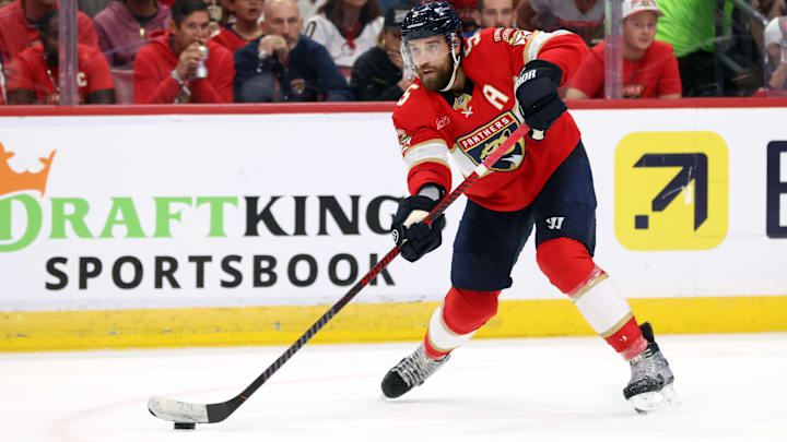 May 11, 2025; Sunrise, Florida, USA; Florida Panthers defenseman Aaron Ekblad (5) passes the puck against the Toronto Maple Leafs during the second period in game four of the second round of the 2025 Stanley Cup Playoffs at Amerant Bank Arena. Mandatory Credit: Kim Klement Neitzel-Imagn Images