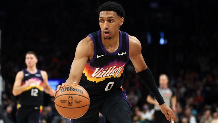 Jan 9, 2026; Phoenix, Arizona, USA; Phoenix Suns forward Ryan Dunn (0) against the New York Knicks at Mortgage Matchup Center. Mandatory Credit: Mark J. Rebilas-Imagn Images