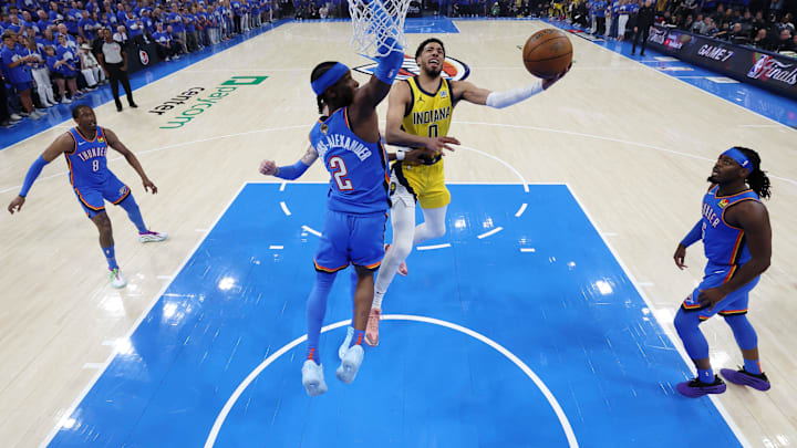 Jun 22, 2025; Oklahoma City, Oklahoma, USA; Indiana Pacers guard Tyrese Haliburton (0) drives to the basket against Oklahoma City Thunder guard Shai Gilgeous-Alexander (2) during game seven of the 2025 NBA Finals at Paycom Center. Mandatory Credit: Matthew Stockman-Pool Photo via Imagn Images