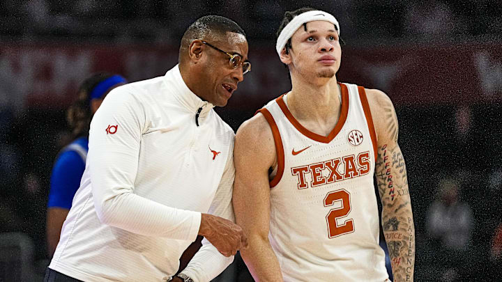 Texas Longhorns head coach Rodney Terry talks to guard Chendall Weaver (2) during the game against New Orleans at the Moody Center on Thursday, Dec. 19, 2024.