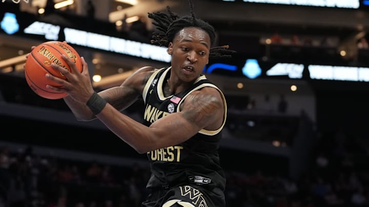 Mar 11, 2026; Charlotte, NC, USA; Wake Forest Demon Deacons forward Tre'von Spillers (25) grabs a rebound in the second half at Spectrum Center. Mandatory Credit: Bob Donnan-Imagn Images
