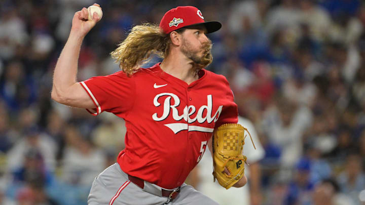 Sep 30, 2025: Cincinnati Reds relief pitcher Scott Barlow (58) pitches during the fourth inning against the Los Angeles Dodgers during game one of the Wildcard round for the 2025 MLB playoffs at Dodger Stadium. 