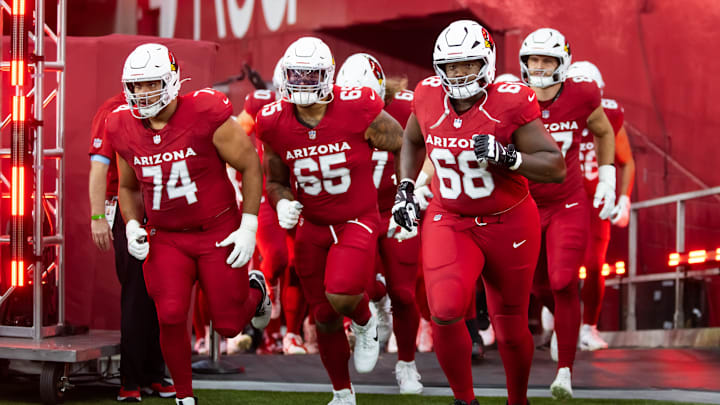 Aug 10, 2024; Glendale, Arizona, USA; Arizona Cardinals guard Isaiah Adams (74), offensive tackle Elijah Wilkinson (65) and Kelvin Beachum (68) against the New Orleans Saints during a preseason NFL game at State Farm Stadium. Mandatory Credit: Mark J. Rebilas-Imagn Images
Aug 10, 2024; Glendale, Arizona, USA; Arizona Cardinals guard Isaiah Adams (74), offensive tackle Elijah Wilkinson (65) and Kelvin Beachum (68) against the New Orleans Saints during a preseason NFL game at State Farm Stadium. Mandatory Credit: Mark J. Rebilas-Imagn Images