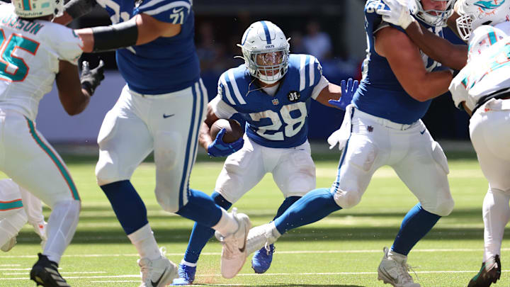 Sep 7, 2025; Indianapolis, Indiana, USA; Indianapolis Colts running back Jonathan Taylor (28) runs during the first half against the Miami Dolphins at Lucas Oil Stadium. Mandatory Credit: Trevor Ruszkowski-Imagn Images
