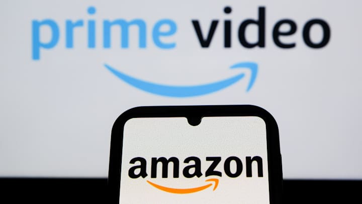 In this photo illustration, an Amazon logo is displayed on a... In this photo illustration, an Amazon logo is displayed on a...