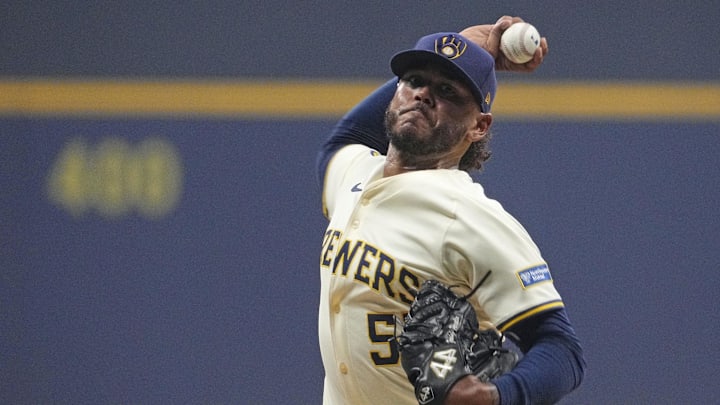 Oct 14, 2025; Milwaukee, Wisconsin, USA; Milwaukee Brewers pitcher Freddy Peralta (51) throws pitch against the Los Angeles Dodgers in the first inning during game two of the NLCS round for the 2025 MLB playoffs at American Family Field. Mandatory Credit: Michael McLoone-Imagn Images Oct 14, 2025; Milwaukee, Wisconsin, USA; Milwaukee Brewers pitcher Freddy Peralta (51) throws pitch against the Los Angeles Dodgers in the first inning during game two of the NLCS round for the 2025 MLB playoffs at American Family Field. Mandatory Credit: Michael McLoone-Imagn Images