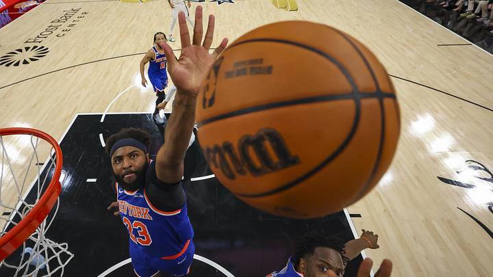 New York Knicks center Mitchell Robinson (23) jumps for the ball during game two of the 2026 NBA Finals at Frost Bank Center.