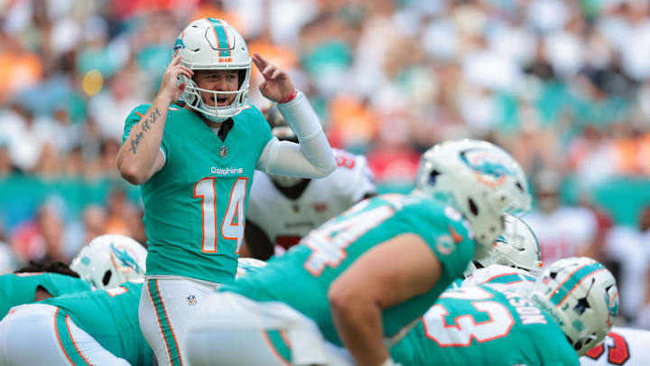 Tampa Bay Buccaneers wide receiver Chris Godwin Jr. (14) directs a play during the first quarter against the Tampa Bay Buccaneers at Hard Rock Stadium. 