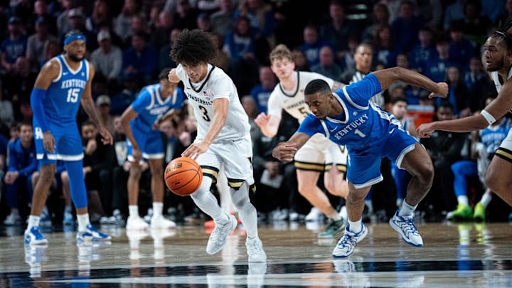 Vanderbilt Commodores guard Tyler Tanner (3) heads up court after stealing the ball from Kentucky Wildcats guard Lamont Butler (1) during their game at Memorial Gym in Nashville, Tenn., Saturday, Jan. 25, 2025.
