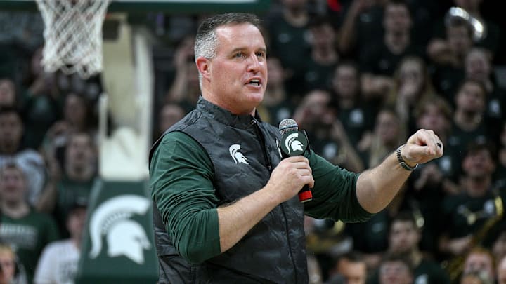 Dec 2, 2025; East Lansing, Michigan, USA;  Michigan State head football coach Pat Fitzgerald watches the Spartans defeat the Iowa Hawkeyes at Jack Breslin Student Events Center. Mandatory Credit: Dale Young-Imagn Images
