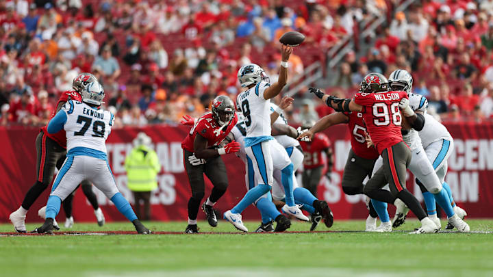 Dec 29, 2024; Tampa, Florida, USA; Carolina Panthers quarterback Bryce Young (9) is pressured by Tampa Bay Buccaneers linebacker Anthony Nelson (98) in the fourth quarter at Raymond James Stadium. Mandatory Credit: Nathan Ray Seebeck-Imagn Images Dec 29, 2024; Tampa, Florida, USA; Carolina Panthers quarterback Bryce Young (9) is pressured by Tampa Bay Buccaneers linebacker Anthony Nelson (98) in the fourth quarter at Raymond James Stadium. Mandatory Credit: Nathan Ray Seebeck-Imagn Images