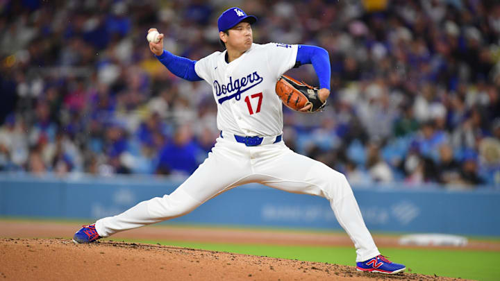 Mar 31, 2026; Los Angeles, California, USA; Los Angeles Dodgers two-way player Shohei Ohtani (17) throws to the plate during the third inning against the Cleveland Guardians at Dodger Stadium. Mandatory Credit: Gary A. Vasquez-Imagn Images