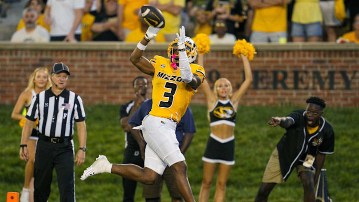 Sep 21, 2024; Columbia, Missouri, USA; Missouri Tigers wide receiver Luther Burden III (3) catches a touchdown pass during overtime against the Vanderbilt Commodores at Faurot Field at Memorial Stadium. Mandatory Credit: Jay Biggerstaff-Imagn Images Sep 21, 2024; Columbia, Missouri, USA; Missouri Tigers wide receiver Luther Burden III (3) catches a touchdown pass during overtime against the Vanderbilt Commodores at Faurot Field at Memorial Stadium. Mandatory Credit: Jay Biggerstaff-Imagn Images