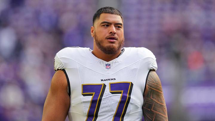 Nov 9, 2025; Minneapolis, Minnesota, USA; Baltimore Ravens guard Daniel Faalele (77) warms up before the game against the Minnesota Vikings at U.S. Bank Stadium. Mandatory Credit: Brad Rempel-Imagn Images Nov 9, 2025; Minneapolis, Minnesota, USA; Baltimore Ravens guard Daniel Faalele (77) warms up before the game against the Minnesota Vikings at U.S. Bank Stadium. Mandatory Credit: Brad Rempel-Imagn Images