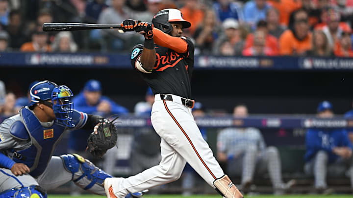 Oct 2, 2024; Baltimore, Maryland, USA; Baltimore Orioles outfielder Cedric Mullins (31) hits a solo home run against the Kansas City Royals in the fifth inning in game two of the Wild Card round for the 2024 MLB Playoffs at Oriole Park at Camden Yards. Mandatory Credit: Tommy Gilligan-Imagn Images