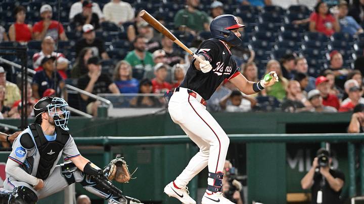 Aug 28, 2026; Washington, District of Columbia, USA; Washington Nationals left fielder Daylen Lile (4) hits a RBI triple against the Miami Marlinsduring the seventh inning at Nationals Park. Mandatory Credit: Brad Mills-Imagn Images