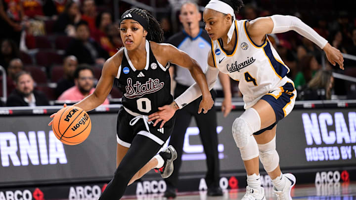 Mar 22, 2025; Los Angeles, California, USA; Mississippi State Bulldogs guard Denim DeShields (0) drives to the basket past California Golden Bears guard Kayla Williams (4) during the first quarter of an NCAA Tournament game at Galen Center. Mandatory Credit: Robert Hanashiro-Imagn Images Mar 22, 2025; Los Angeles, California, USA; Mississippi State Bulldogs guard Denim DeShields (0) drives to the basket past California Golden Bears guard Kayla Williams (4) during the first quarter of an NCAA Tournament game at Galen Center. Mandatory Credit: Robert Hanashiro-Imagn Images