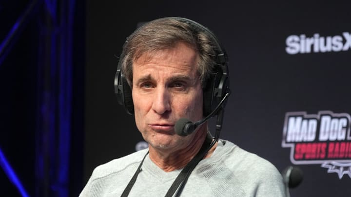 Chris Russo on the SiriusXM Mad Dog Sports Radio set on radio row at the Super Bowl 58 media center.