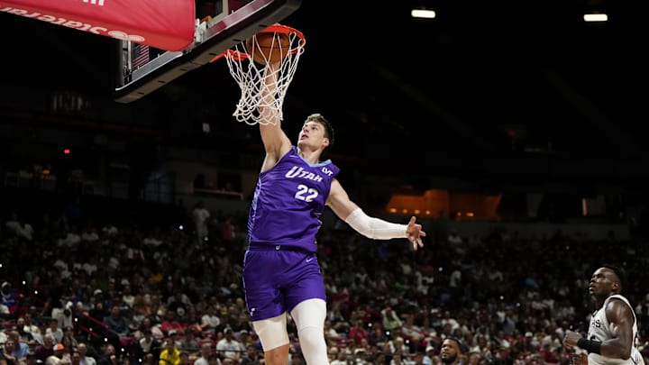 Jul 14, 2025; Las Vegas, NV, USA;  Utah Jazz forward Kyle Filipowski (22) dunks the ball against the San Antonio Spurs during the first half of a NBA basketball game at the Thomas & Mack Center. Mandatory Credit: Lucas Peltier-Imagn Images