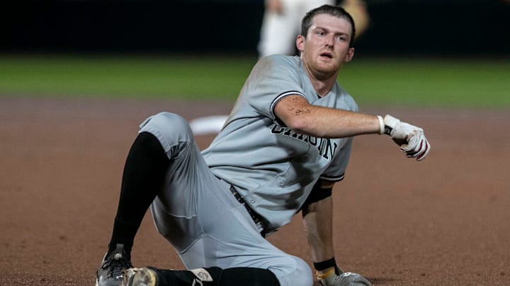 Colorado Rockies prospect Braylen Wimmer looks up after sliding into second base during a game.