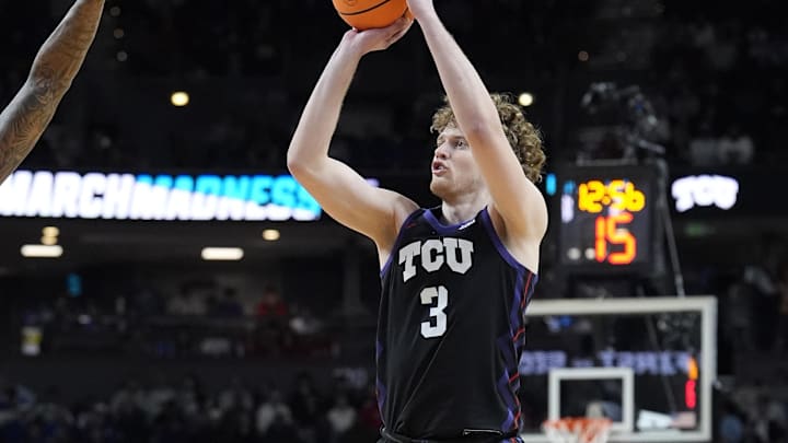 Mar 19, 2026; Greenville, SC, USA; Texas Christian University Horned Frogs guard Liutauras Lelevicius (3) shoots the ball against the Ohio State Buckeyes in the second half during a first round game of the men's 2026 NCAA Tournament at Bon Secours Wellness Arena. Mandatory Credit: Jim Dedmon-Imagn Images
