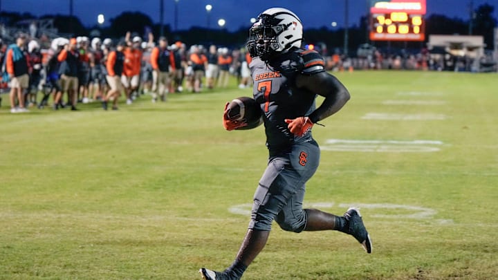 Spruce Creek's Anthony Hayden (7) scored a fourth quarter touchdown to lift his team to big win over Creekside.