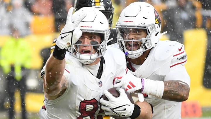 Dec 3, 2023; Pittsburgh, Pennsylvania, USA;  Arizona Cardinals  tight end Trey McBride (85) celebrates a touchdown with running back James Conner (6) against the Pittsburgh Steelers during the second quarter at Acrisure Stadium. Mandatory Credit: Philip G. Pavely-Imagn Images
