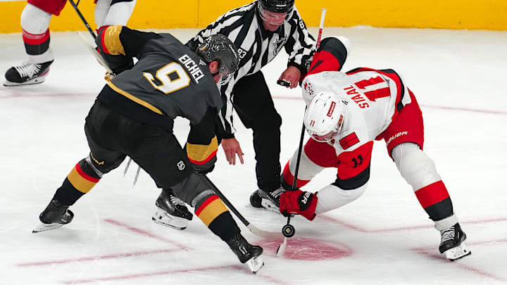 Oct 20, 2025; Las Vegas, Nevada, USA; Vegas Golden Knights center Jack Eichel (9) takes a face off against Carolina Hurricanes center Jordan Staal (11) during the third period at T-Mobile Arena. Mandatory Credit: Stephen R. Sylvanie-Imagn Images Oct 20, 2025; Las Vegas, Nevada, USA; Vegas Golden Knights center Jack Eichel (9) takes a face off against Carolina Hurricanes center Jordan Staal (11) during the third period at T-Mobile Arena. Mandatory Credit: Stephen R. Sylvanie-Imagn Images
