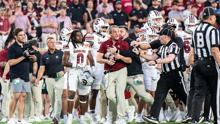 Dec 31, 2024; Orlando, FL, USA; South Carolina Gamecocks head coach Shane Beamer reacts to the Illinois Fighting Illini in the third quarter at Camping World Stadium. Mandatory Credit: Jeremy Reper-Imagn Images Dec 31, 2024; Orlando, FL, USA; South Carolina Gamecocks head coach Shane Beamer reacts to the Illinois Fighting Illini in the third quarter at Camping World Stadium. Mandatory Credit: Jeremy Reper-Imagn Images