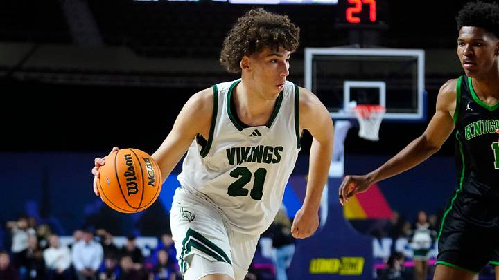 Sunnsylope forward Darius Wabbington (21) drives on St Mary’s forward Cam Williams (1) during the Open Boys Championship game at Arizona Veterans Memorial Coliseum in Phoenix on March 7, 2026.