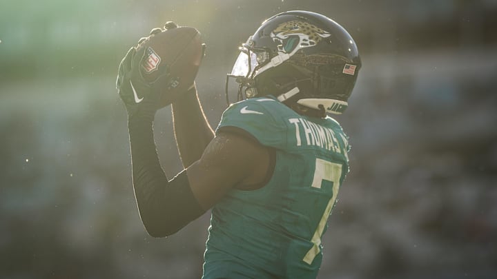 Dec 1, 2024; Jacksonville, Florida, USA; Jacksonville Jaguars wide receiver Brian Thomas Jr (7) makes the catch for the touchdown against the Houston Texans in the fourth quarter at EverBank Stadium. Mandatory Credit: Jeremy Reper-Imagn Images Dec 1, 2024; Jacksonville, Florida, USA; Jacksonville Jaguars wide receiver Brian Thomas Jr (7) makes the catch for the touchdown against the Houston Texans in the fourth quarter at EverBank Stadium. Mandatory Credit: Jeremy Reper-Imagn Images