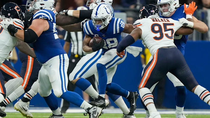 Indianapolis Colts running back Jonathan Taylor (28) rushes the ball Sunday, Sept. 22, 2024, during a game against the Chicago Bears at Lucas Oil Stadium in Indianapolis.