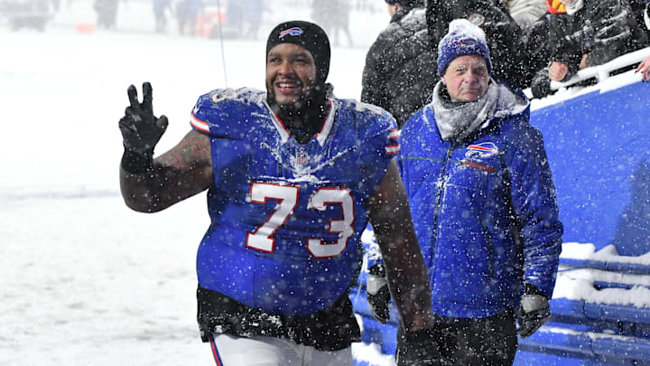 Dec 1, 2024; Orchard Park, New York, USA; Buffalo Bills offensive tackle Dion Dawkins (73) leaves the field after winning a game against the San Francisco 49ers to clinch the AFC East title at Highmark Stadium. Mandatory Credit: Mark Konezny-Imagn Images