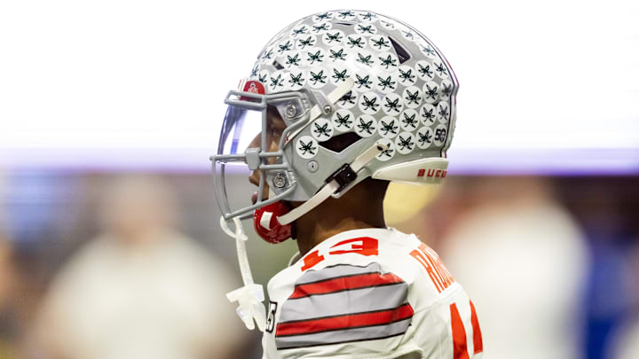 Jan 20, 2025; Atlanta, GA, USA; Detailed view of buckeye leave stickers on the helmet of Ohio State Buckeyes wide receiver Bryson Rodgers (13) against the Notre Dame Fighting Irish during the CFP National Championship college football game at Mercedes-Benz Stadium. Mandatory Credit: Mark J. Rebilas-Imagn Images Jan 20, 2025; Atlanta, GA, USA; Detailed view of buckeye leave stickers on the helmet of Ohio State Buckeyes wide receiver Bryson Rodgers (13) against the Notre Dame Fighting Irish during the CFP National Championship college football game at Mercedes-Benz Stadium. Mandatory Credit: Mark J. Rebilas-Imagn Images